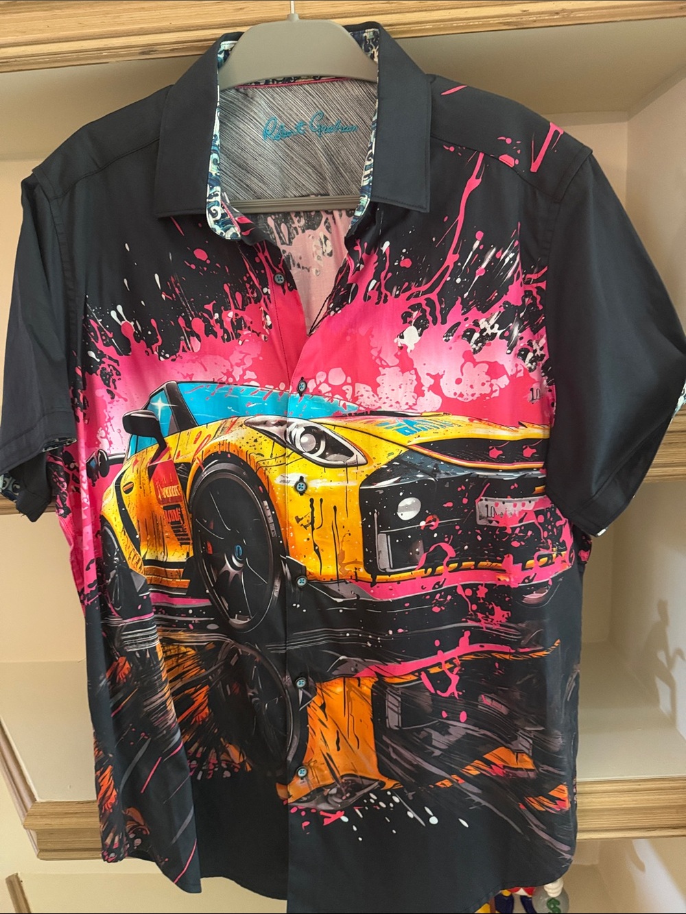 Robert Graham Black Short Sleeve Polo with Yellow Racing Car and Pink Splash